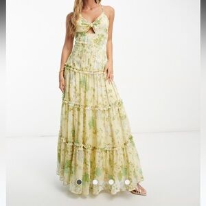 knot front cut out maxi slip dress with raw edge tiers in yellow floral print